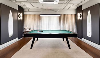 Billiards room with green felt pool table